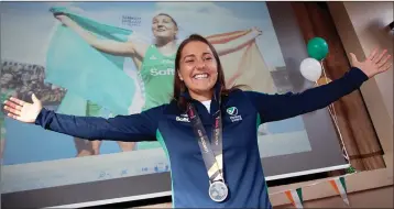  ??  ?? Elena Tice shows off her Hockey World Cup silver medal at her homecoming in Glenealy Hall.