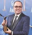  ?? Alberto E. Rodriguez / Getty Images 2017 ?? Ahmad Kiarostami accepts an award for his father.