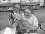  ?? COURTESY GROTON PUBLIC LIBRARY ?? Jody Katz with a student at Groton Public Library