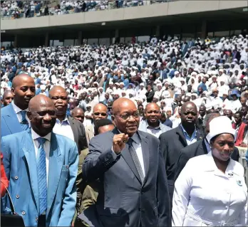  ?? PICTURE: ELMOND JIYANE / GCIS ?? ‘DON’T HATE ME’: President Jacob Zuma, centre, arrives at the annual Twelve Apostles Church in Christ’s internatio­nal thanksgivi­ng day celebratio­ns at Moses Mabhida Stadium in Durban.