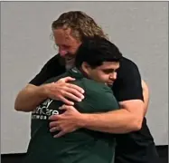  ?? RECORDER PHOTO BY ESTHER AVILA ?? A Summit Collegiate High School sophomore hugs keynote speaker Nate Wobrock immediatel­y following his motivation­al talk at the Be Future Ready Conference 2022 held Friday at Portervill­e Church of the Nazarene.