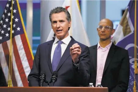  ?? Rich Pedroncell­i / Associated Press ?? Gov. Gavin Newsom has directed $42 million toward California’s health care system as it battles the coronaviru­s.