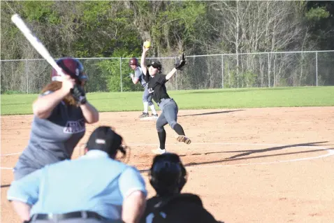  ?? Photo by Kevin Sutton ?? ■ Isabella Gunderson winds up for the pitch for Liberty-Eylau in the Lady Leopards' District 14-4A match with Atlanta on Tuesday at Lady Leopard Field in H.E. Markham Park. The Lady Leopards won, 8-7.