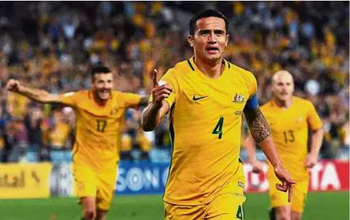 ??  ?? All the best: Tim Cahill (centre) said he and two personal physiother­apists had been working around the clock on the ankle since he injured it in an A-League match on Friday. — AFP