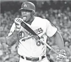  ?? RICHARD MACKSON, USA TODAY SPORTS ?? Los Angeles right fielder Yasiel Puig has been at his best during the postseason.