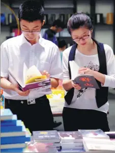  ??  ?? Location holds the key to the success of a 24-hour-a-day bookshop, says Jiang Jun, manager of Sanlian Taofen Sanlitun Bookstore.