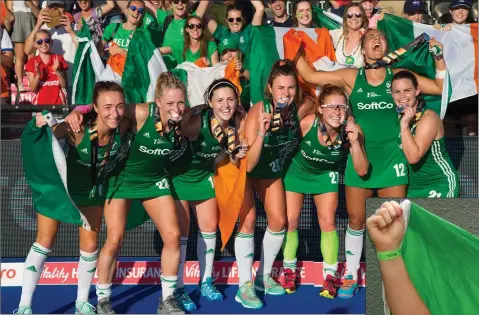  ??  ?? Ireland players, from left, Yvonne O’Byrne, Nicola Daly, Roisin Upton, Deirdre Duke, Zoe Wilson, Elena Tice, and Lizzie Colvin celebrate with their silver medals at the Hockey World Cup.
