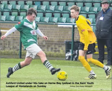  ?? Picture: Chris Davey FM5068619 ?? Ashford United under-16s take on Herne Bay (yellow) in the Kent Youth League at Homelands on Sunday