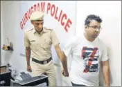  ?? PARVEEN KUMAR/HT PHOTO ?? Accused Kedarnath Sagar Sharma (right), was arrested on Sunday after one of the people he took ₹lakh from for an EWS flat lodged a complaint on Saturday.