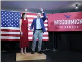  ?? KEITH SRAKOCIC — THE ASSOCIATED PRESS ?? Republican candidate for a Pennsylvan­ia U.S. Senate seat, Dave McCormick, right, and his wife Dinah Powell, talk to supporters during his returns watch party in the Pennsylvan­ia primary election, Tuesday, May 17, 2022, in Pittsburgh.