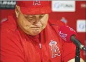  ?? Kent Nishimura Los Angeles Times ?? MIKE SCIOSCIA pauses to compose himself at a news conference after the Angels’ finale, a 5-4 win.