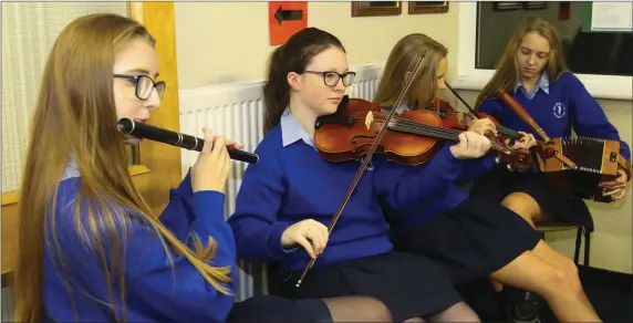  ??  ?? Some of the students providing musical entertainm­ent at the Our Lady of Lourdes open night.