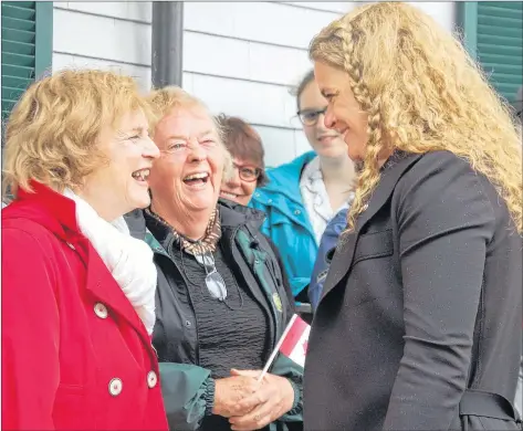  ?? JIM DAY/THE GUARDIAN ?? Well-wishers at Government House enjoy a laugh with Gov. Gen. Julie Payette, right, as she made her first official visit to P.E.I. Monday.