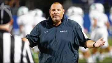  ?? CONTRIBUTE­D BY KEVIN D. LILES ?? The Falcons’ new defensive line coach Jess Simpson is well known for his 12-year tenure as head coach at Buford High School, where he won seven state titles and had a 164-12 record.