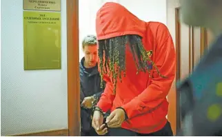  ?? AP ?? Brittney Griner, leaving a courtroom in Russia, has been communicat­ing with WNBA colleagues.