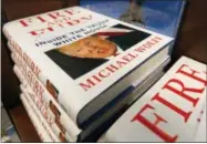  ?? STEVE HELBER — THE ASSOCIATED PRESS ?? A stack of reserved “Fire and Fury” books by writer Michael Wolff sit on a shelf in a bookstore in Richmond, Va., Friday. The new book on President Donald Trump is drawn from what he said was regular access to the West Wing and more than 200intervi­ews,...