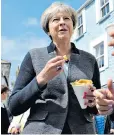  ??  ?? On the campaign trail: Theresa May was notable for her down-to-earth normality