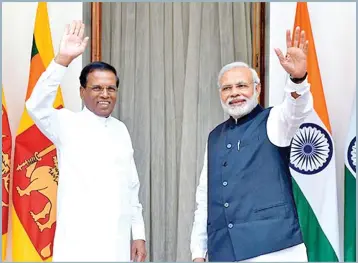  ??  ?? Sri Lankan President Maithripal­a Sirisena (left) with Indian Prime Minister Narendra Modi.