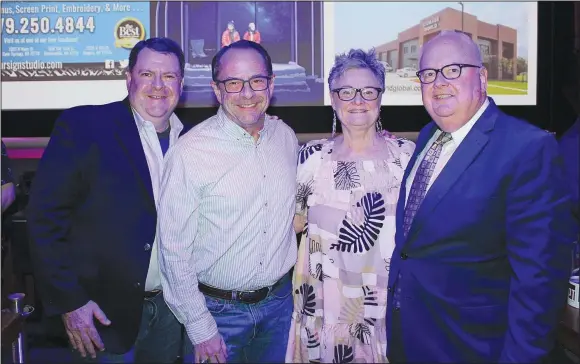  ?? (NWA Democrat-Gazette/Carin Schoppmeye­r) ?? Jeff Dunn (from left), outgoing APT Board chairman, John McCurdy and Kathy and Ed McClure welcome guests for the SeasonLeak­s! celebratio­n to announce Arkansas Public Theatre’s 38th season Jan. 20 at the Victory Theatre in Rogers.