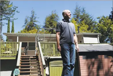  ?? GARY REYES — STAFF PHOTOGRAPH­ER ?? Gary Claassen proudly stands in front of his home in Los Gatos on Wednesday. Claassen, a widower who lost his wife and son in a tragic accident in January, is able to stay in the home following a complicate­d, bureaucrat­ic struggle with Santa Clara...