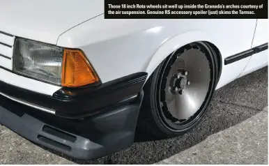  ??  ?? Those 18 inch Rota wheels sit well up inside the Granada’s arches courtesy of the air suspension. Genuine RS accessory spoiler (just) skims the Tarmac.