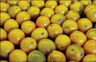  ?? PALM BEACH POST FILE ?? The USDA now says Florida’s 2017-18 citrus crop will produce 46 million boxes of oranges. Tuesday’s forecast is a decline of more than 80 percent since the 1997-98 peak.