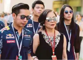  ?? AP PIC ?? Vorayuth ‘Boss’ Yoovidhya (left), whose grandfathe­r co-founded energy drink company Red Bull, with his mother, Daranee, at the Abu Dhabi Formula 1 Grand Prix in November last year.