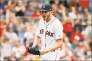  ?? Winslow Townson / Associated Press ?? Chris Sale pumps his fist after striking out Mike Zunino to end the seventh inning on Sunday.