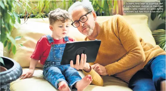  ??  ?? Screens have been an essential part of many families’ routines as they tried to keep children occupied during lockdown, but how much is too much?