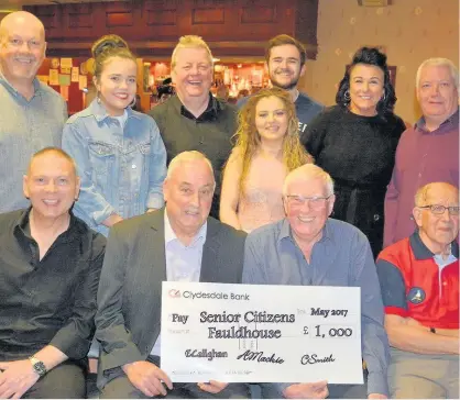  ??  ?? Show’s success A packed audience enjoyed another ‘Entertaine­rs Of The Year’ show in Fauldhouse in aid of local senior citizens. The annual concert, now into it’s 37th year has raised over £35,000 during this time. Organisers Eddie Callaghan, Al Mackie...