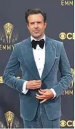  ??  ?? ▲ jason sudeikis in tom ford Sudeikis said that in his blue velvet tuxedo under the bright lights of the red carpet, he was “cooking like Hot Pockets.”