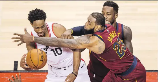  ?? PHOTOS: PETER J THOMPSON ?? LeBron James and the Cavaliers snatched away the win from DeMar DeRozan and the Toronto Raptors in Game 1 of their series Tuesday at the Air Canada Centre.