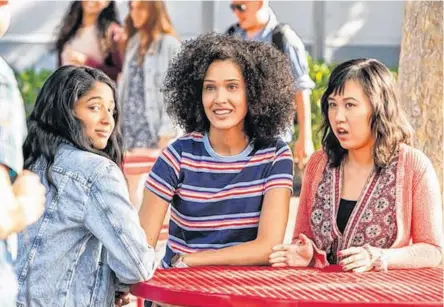  ?? LARA SOLANKI/NETFLIX ?? Maitreyi Ramakrishn­an (left) stars in Never Have I Ever as Devi, a delightful protagonis­t who has endearing, thoughtful friends with stories of their own, Fabiola (Lee Rodriguez), (centre), and Eleanor (Ramona Young).