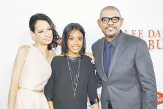  ??  ?? Whitaker poses with his wife Keisha (left) and daughter Autumn at the premiere of ‘Lee Daniels’ The Butler’, in Los Angeles, California on Aug 12, 2013. — Reuters file photo