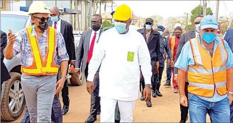  ??  ?? Governor Ifeanyi Ugwuanyi of Enugu State flanked by Commission­er for Works and Infrastruc­ture, Greg Nnaji ( left) and Project Manager, IDC Constructi­on Limited, Youssef Zghaib, during a tour of the flyover at T- Junction, Abakpa Nike, in the capital … yesterday.