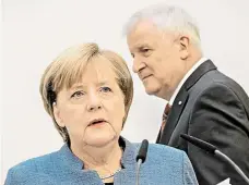  ?? Foto: Profimedia.cz ?? Kompromis Kancléřka Angela Merkelová a bavorský premiér a šéf sesterské CSU Horst Seehofer se dohodli o migraci.