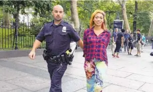  ?? JEFFERSON SIEGEL/DAILY NEWS ?? A man (top) was slashed in arm in City Hall Park melee. Others (above) are led away by cops.