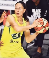  ?? Julio Aguilar / Getty Images ?? The Storm’s Sue Bird looks to pass during Game 1 of the WNBA finals. Bird had a finals-record 16 assists in a 93-80 Seattle win.