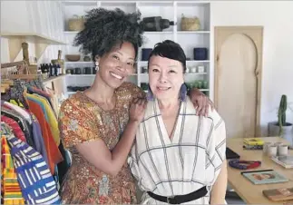  ?? Photograph­s by Kirk McKoy Los Angeles Times ?? MARIKO MCKITTRICK and her mom, Akiko Yamaguchi, in Marikoko, Mckittrick’s boutique.