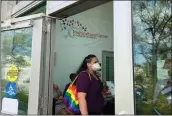  ?? Trevor Morgan/The Signal ?? Kelly Ramnarine, president of Queer SCV, stands in the doorway of the Multicultu­ral Center’s temporary location at College of the Canyons.