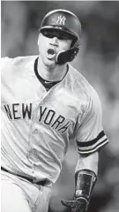  ?? NICK WASS/AP ?? The Yankees’ Gary Sánchez reacts as he heads to first after hitting a three-run homer in the ninth inning Monday night.