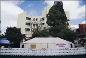  ?? ASHLEY LANDIS — THE ASSOCIATED PRESS ?? Medical tents are set up outside the emergency room at UCI Medical Center in Irvine on Thursday.