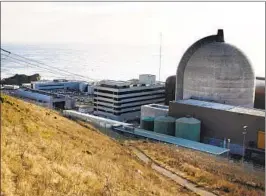  ?? AP FILE ?? One of Pacific Gas and Electric’s Diablo Canyon nuclear reactors is seen in Avila Beach. Groups on Tuesday expressed opposition to keeping the plant open.