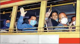  ??  ?? Indian nationals stranded in Bahrain board a bus on their arrival at Calicut Internatio­nal Airport, as part of an evacuation operation due to the Coronaviru­s pandemic, in Kozhikode, on Monday