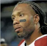  ?? ELAINE THOMPSON — THE ASSOCIATED
PRESS ?? Arizona Cardinals wide receiver Larry Fitzgerald stands on the field following an NFL football game against the Seattle Seahawks.
