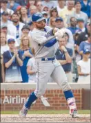  ?? The Associated Press ?? Kevin Pillar of the Toronto Blue Jays hits an RBI-single during the 10th inning.