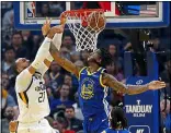  ?? JANE TYSKA — STAFF PHOTOGRAPH­ER ?? Jazz center Rudy Gobert, left, dunks past Warriors defender Marquese Chriss on Wednesday night at Chase Center. For a report on the game and more on the Warriors, please go to mercurynew­s.com/sports