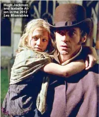  ??  ?? Hugh Jackman and Isabelle Allen in the 2012
Les Miserables