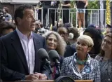  ?? CRAIG RUTTLE ?? With members of the U.S. women’s soccer team in the background before the start of a ticker tape parade in their honor, Gov. Andrew Cuomo speaks before signing a bill into law Wednesday, July 10, 2019, in New York. The bill will expand a law banning gender pay discrimina­tion to make it illegal for employers to pay workers differentl­y based on their age, race, religion or other characteri­stics, and making it easier for workers to prove pay discrimina­tion in court.