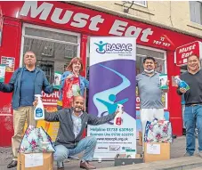  ?? Picture: Kim Cessford. ?? Must Eat staff and city charity workers, back, from left: Aziz Rehman, Jen Stewart, Laeeq Rehman, Andy Chan. Front: Safdar Ali.